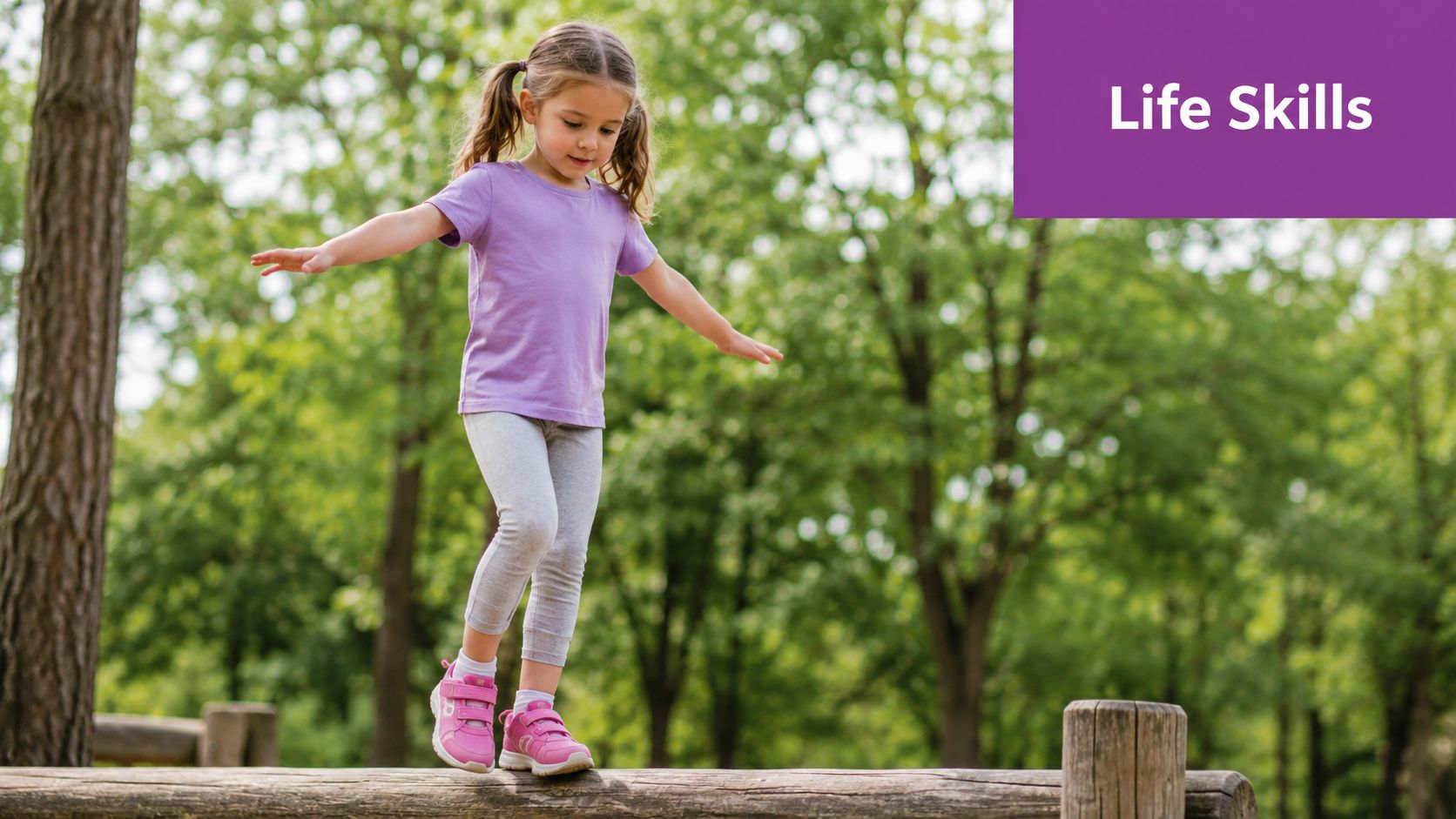 Young girl balancing on a low wooden beam, practising balance and gross motor skills