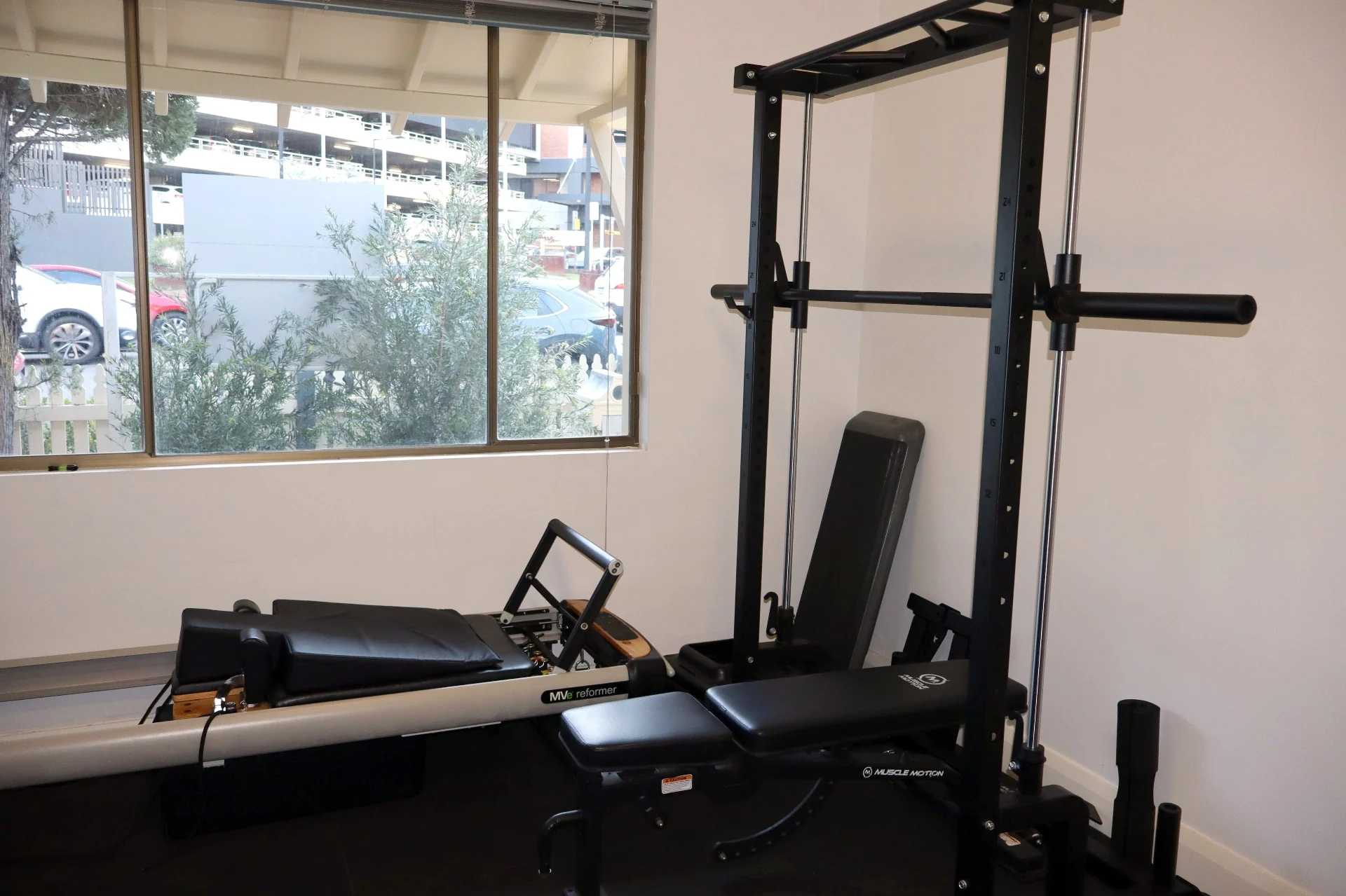 Physiotherapy gym at Square One with MVe pilates reformer, adjustable bench and Muscle Motion squat rack